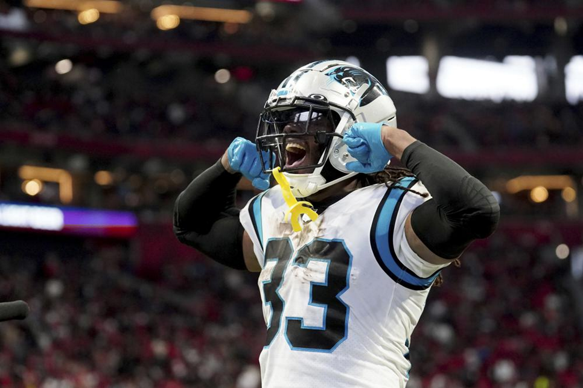 nfl 2022 carolina panthers rb donta foreman celebrates a td in a game against the atlanta falcons oct 30 2022 in atlanta ap photo john bazemore