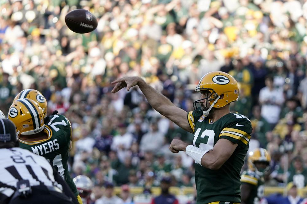 nfl 2022 green bay packers qb aaron rodgers throws a pass during game against new england patriots oct 2 2022 in green bay wis ap photo morry gash