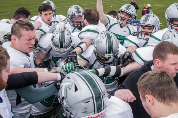 Belfast Trojans game winning huddle.