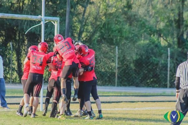 Brazil - Timbo athletes celebrate in the end zone after one of their many touchdowns