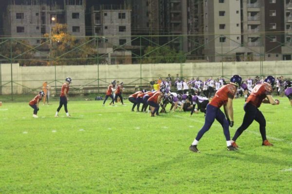 Goiania Rednecks QB, Paulo Paiva, prepares to take a snap against the Sorocaba Vipers, in Goiania, Goias.