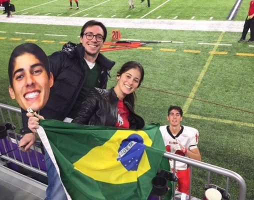 Thiago Ribeiro, of Uberlândia, Minas Gerais, Brazil, gets some love from Brazilian American football fans who came to watch St. Croix's state semifinal victory at the Minnestoa Vikings US Bank Stadium.