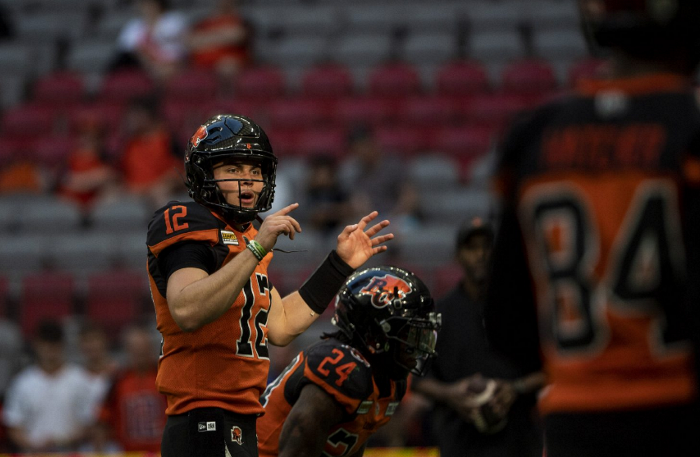 CFL-2022-June-26-bc-lions-vs-toronto-BC-Lions-QB-Nathan-Rourke-directing-Lions-offense-Photo-The-Canadian-Press.png