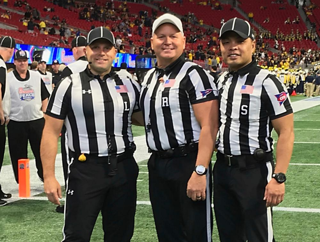 NFL-2018-Line-judge-Derek-Anderson-referee-Mike-Defee-and-side-judge-Lo-van-Pham-pose-for-a-photo-before-the-Peach-Bowl-NCAA-college-football-game-in-Atlanta-Photo-Lo-van-Pham-1024x775.png